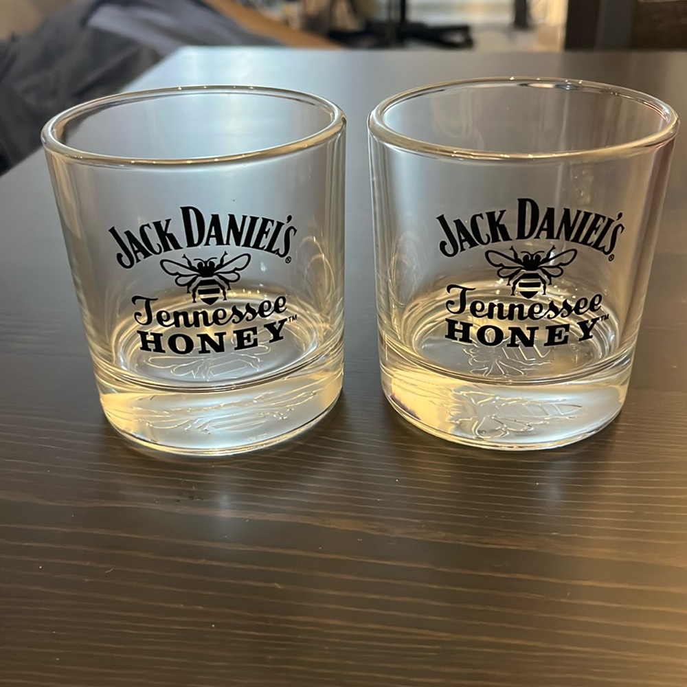 Two Jack Daniel’s glass cups.